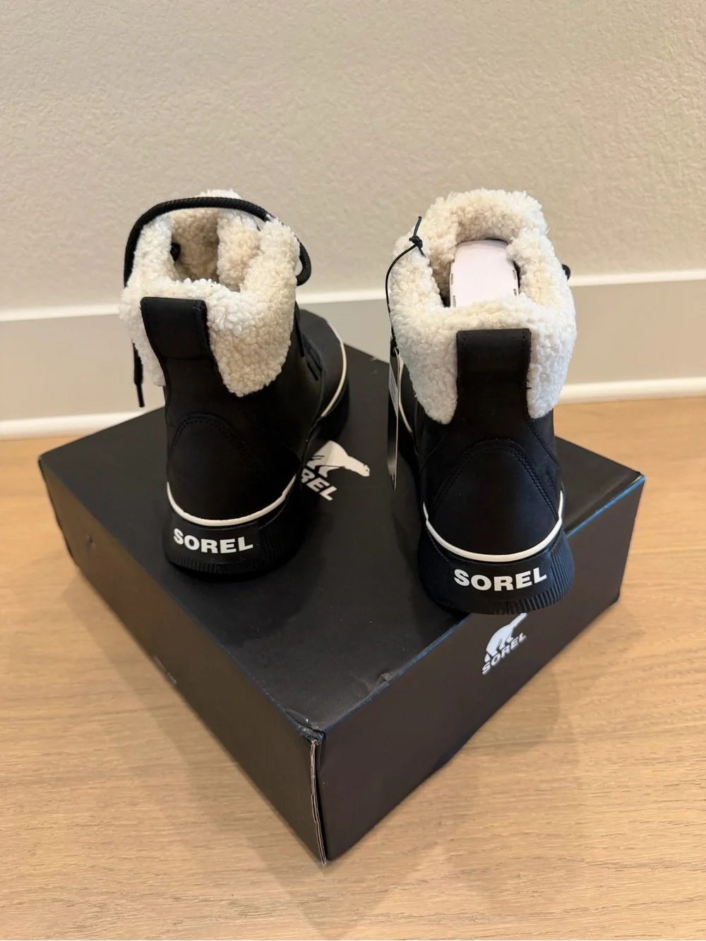 Sorel Black and White Sherpa-Trim Insulated Waterproof Boots